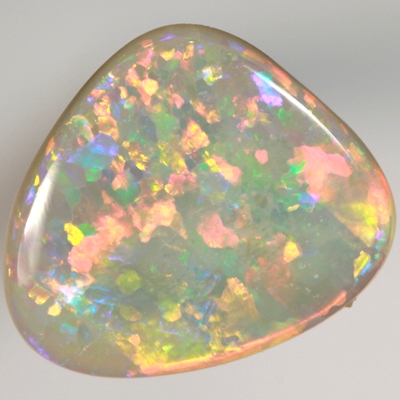 SOLID SEMI BLACK OPAL Quality opal. Very bright, red and orange rolling flashes over green and purple. With VIDEO